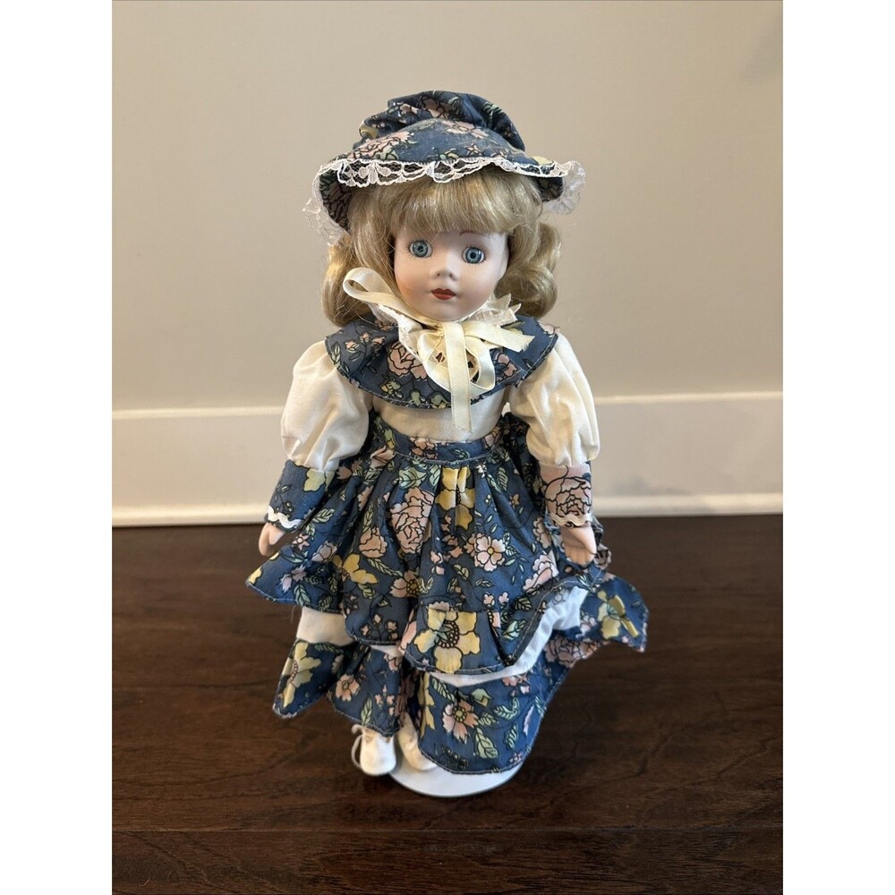 Vintage Porcelain Doll 16 Inches In A Blue Floral Outfit